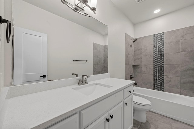 full bathroom with vanity, toilet, and tiled shower / bath combo