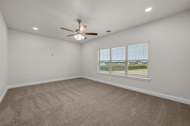 carpeted empty room with ceiling fan