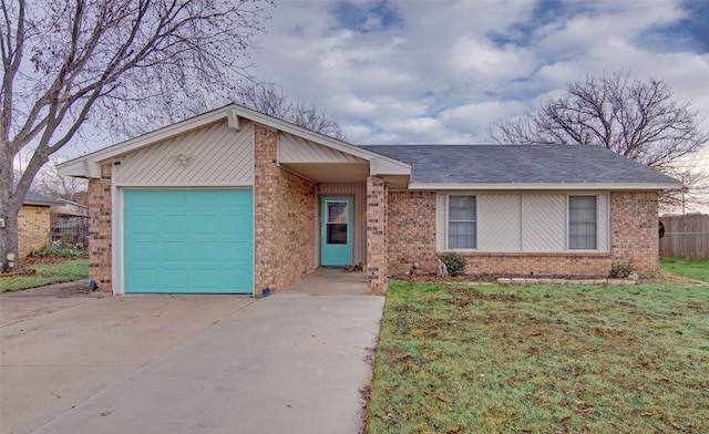 ranch-style house with a garage and a front lawn