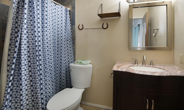 bathroom featuring vanity, a shower with curtain, and toilet