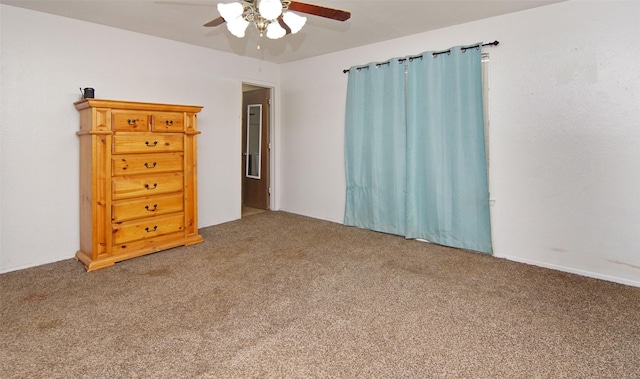 unfurnished bedroom with carpet flooring and ceiling fan