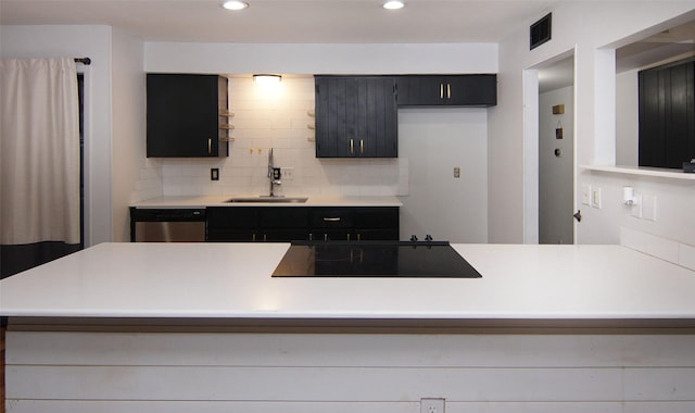 kitchen with sink, dishwasher, backsplash, black electric cooktop, and kitchen peninsula