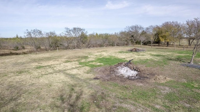 view of yard with a rural view