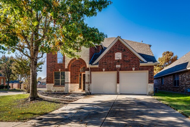 view of front of property featuring a garage