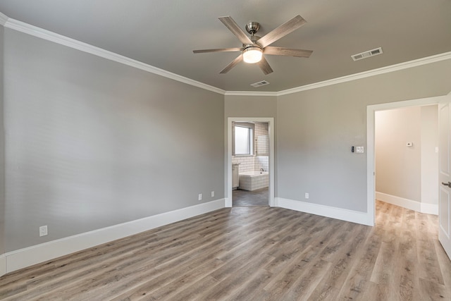 unfurnished room featuring ornamental molding, ceiling fan, and light hardwood / wood-style floors