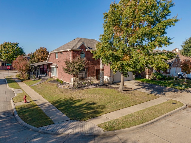 view of front facade with a front yard