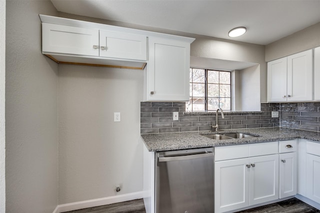 kitchen featuring dishwasher, backsplash, sink, dark hardwood / wood-style floors, and white cabinetry