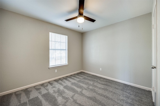 empty room featuring ceiling fan and carpet floors