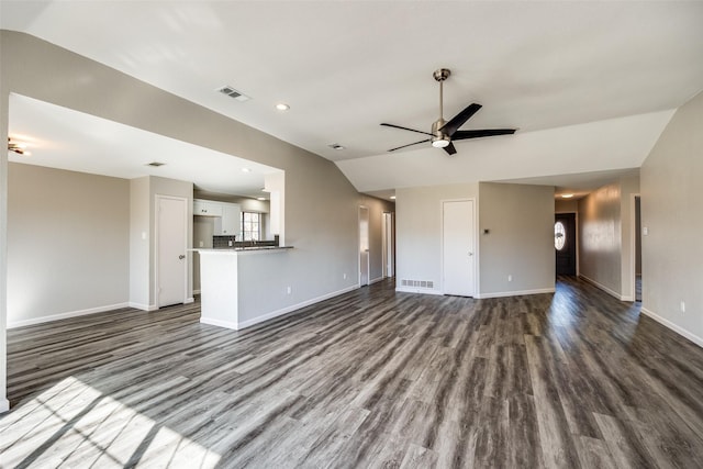 unfurnished living room featuring dark hardwood / wood-style floors, ceiling fan, and lofted ceiling