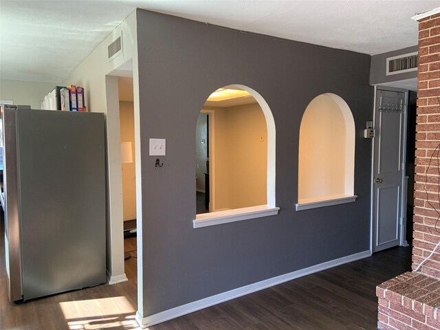 interior space with dark hardwood / wood-style flooring