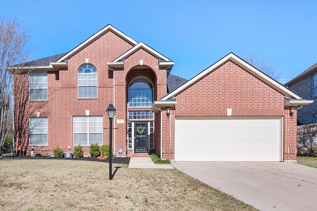 front facade featuring a garage and a front lawn