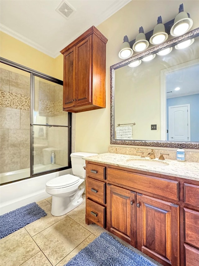 full bathroom featuring tile patterned flooring, vanity, ornamental molding, and enclosed tub / shower combo