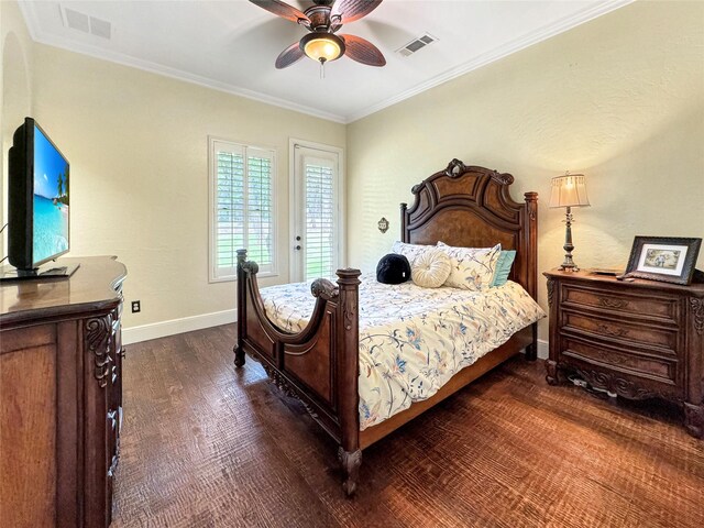 bedroom featuring ceiling fan, crown molding, and dark wood-type flooring