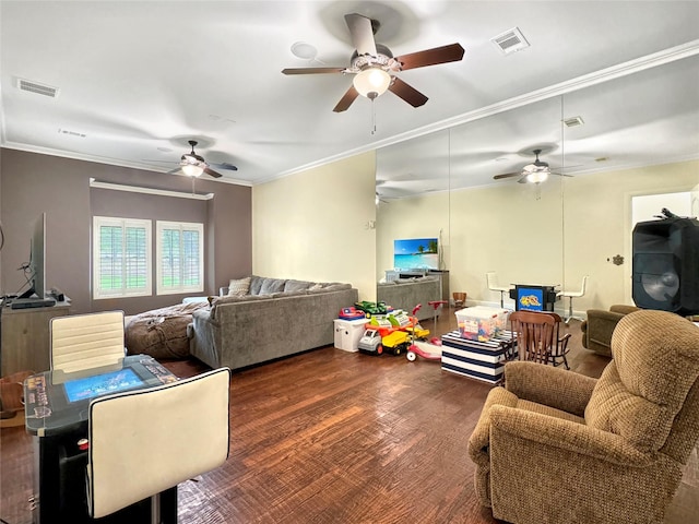 living room with dark hardwood / wood-style floors and ornamental molding