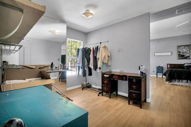 recreation room with light hardwood / wood-style floors