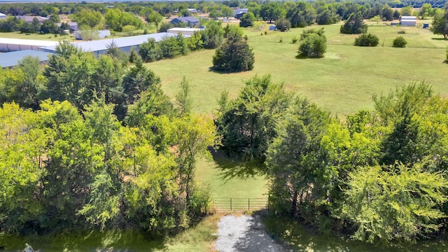 birds eye view of property with a rural view