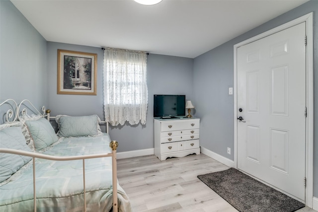 bedroom featuring light hardwood / wood-style floors