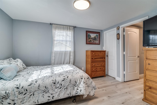 bedroom featuring light hardwood / wood-style floors