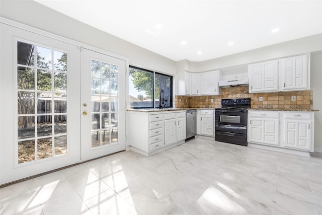 kitchen featuring decorative backsplash, french doors, black range with electric cooktop, and white cabinetry