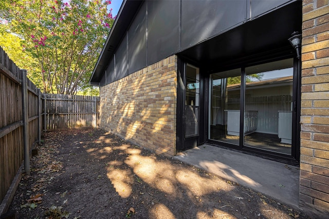 view of home's exterior featuring a patio area