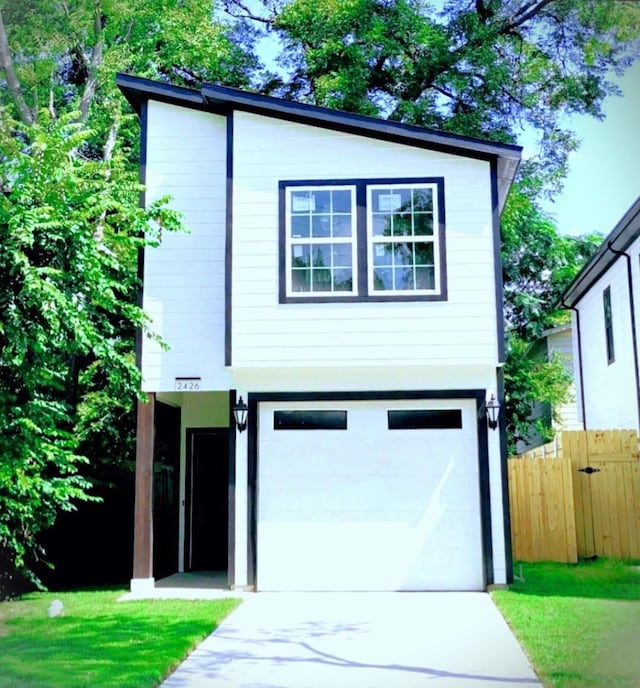 view of front of home with a garage