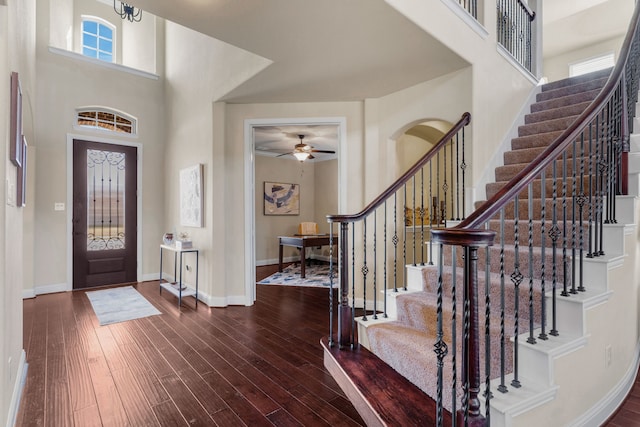 10014 Edgeway Cir, Rowlett, TX 75089 - entrance foyer with ceiling fan, stairs, wood-type flooring, and a towering ceiling