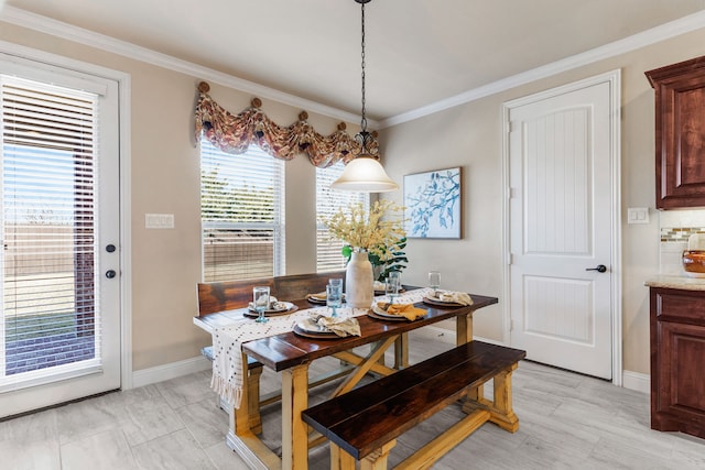 10014 Edgeway Cir, Rowlett, TX 75089 - dining area with crown molding and baseboards