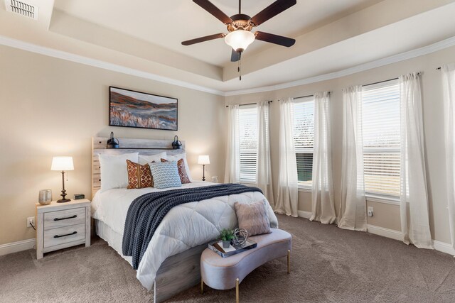 10014 Edgeway Cir, Rowlett, TX 75089 - bedroom with carpet flooring, a tray ceiling, baseboards, ornamental molding, and ceiling fan