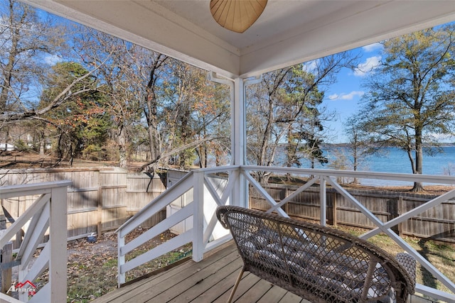 deck featuring a water view