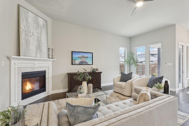 unfurnished living room with dark hardwood / wood-style floors and ceiling fan with notable chandelier