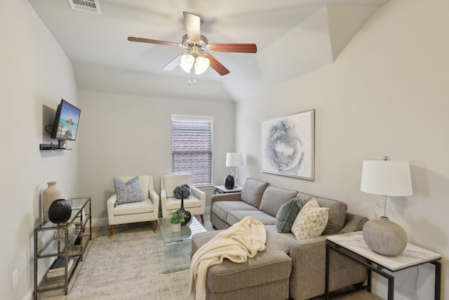 living room featuring vaulted ceiling and ceiling fan