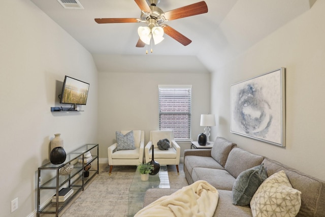 living room featuring vaulted ceiling and ceiling fan