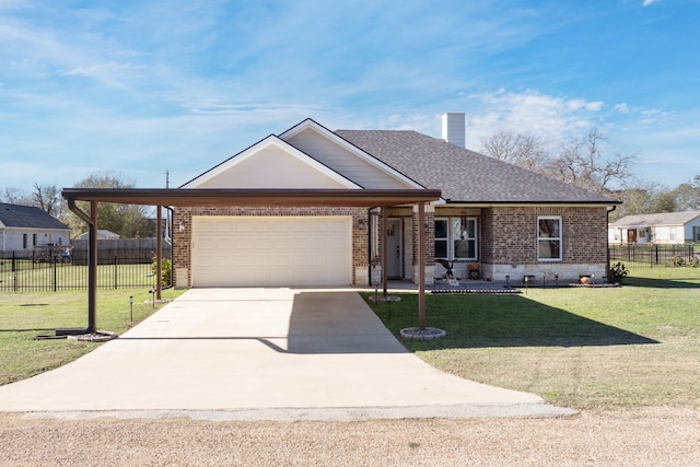 view of front of property featuring a garage and a front lawn