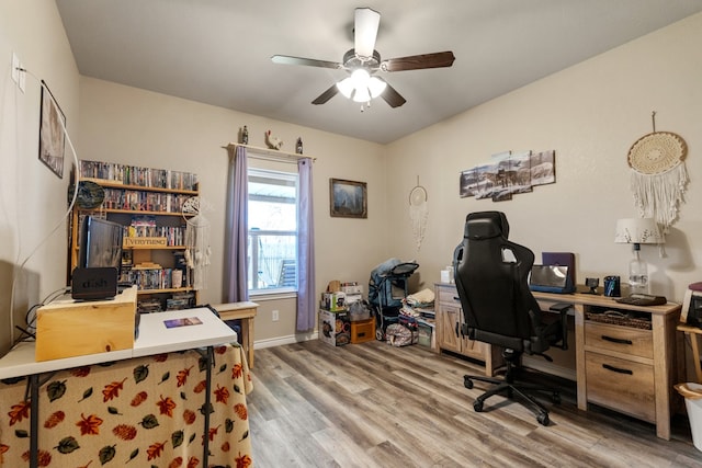 home office featuring ceiling fan and hardwood / wood-style floors