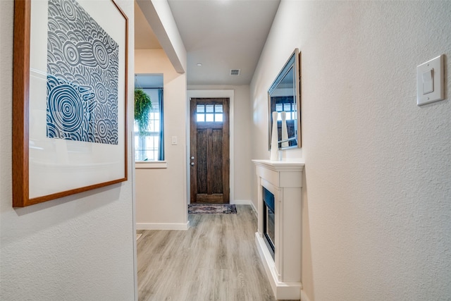 interior space with light hardwood / wood-style flooring