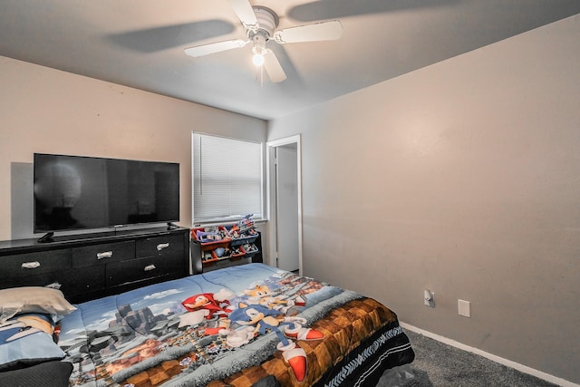 bedroom with ceiling fan and carpet floors