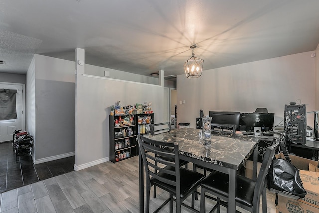 dining area featuring a chandelier