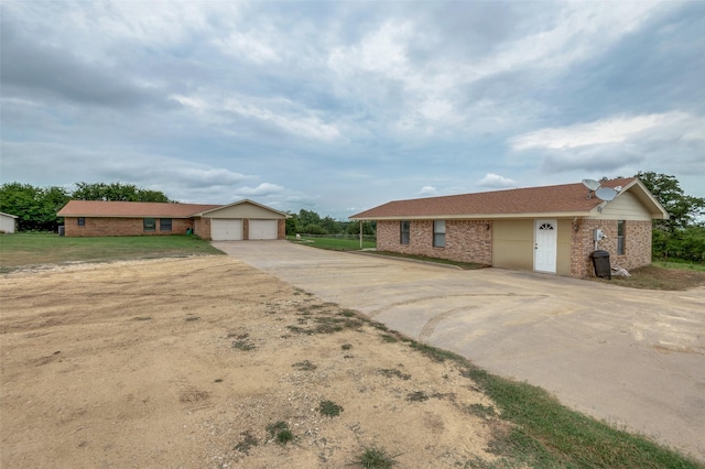 ranch-style home with a garage