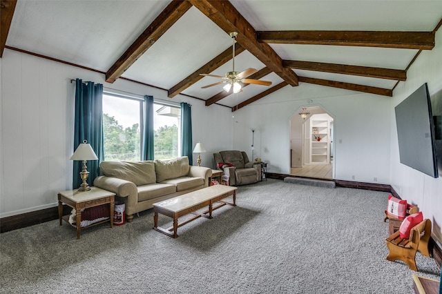 carpeted living room with lofted ceiling with beams and ceiling fan