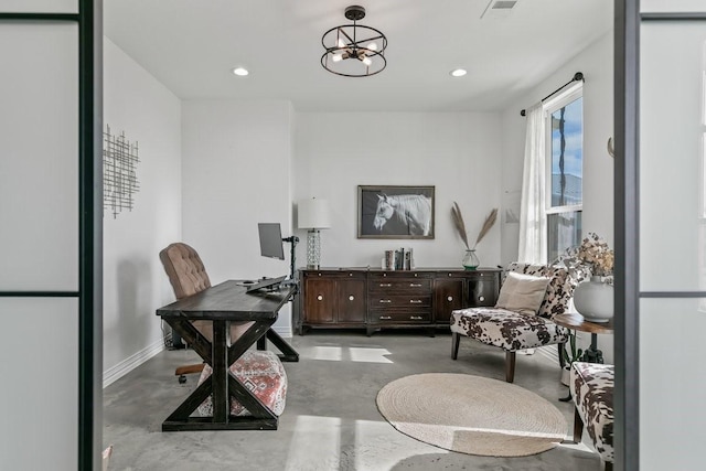 home office with concrete flooring