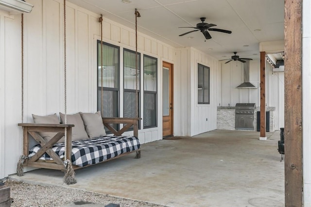 view of patio featuring exterior kitchen and ceiling fan