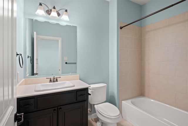 full bathroom featuring vanity, toilet, and shower / tub combination