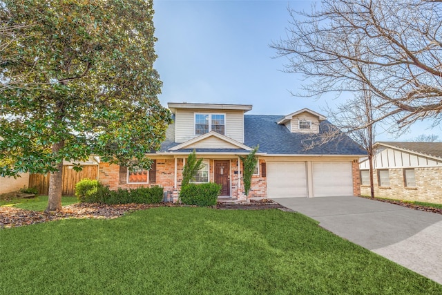 view of front of home with a front yard and a garage