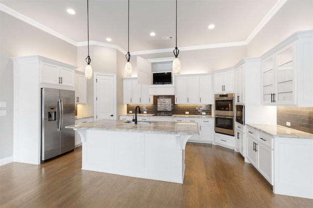 kitchen featuring a sink, white cabinets, dark wood-style floors, and stainless steel appliances