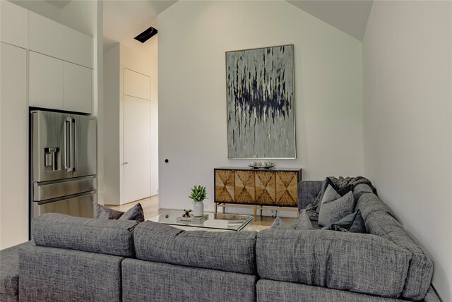 living room with vaulted ceiling