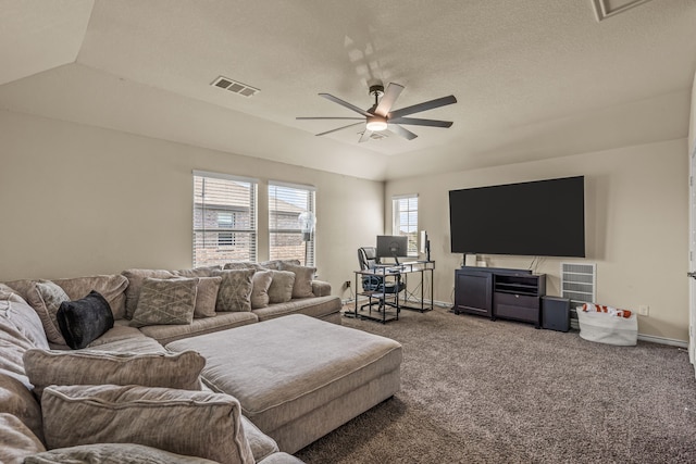 living room featuring carpet flooring, ceiling fan, a textured ceiling, and vaulted ceiling