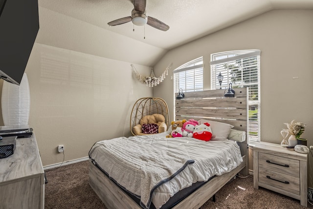 carpeted bedroom featuring ceiling fan and lofted ceiling