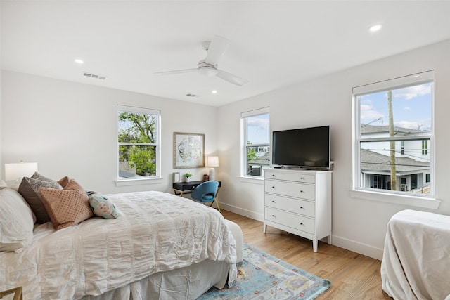 bedroom featuring ceiling fan and light wood-type flooring