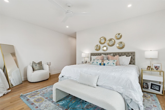 bedroom featuring ceiling fan and light wood-type flooring