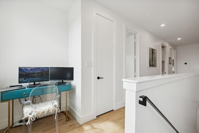 office area with light hardwood / wood-style flooring